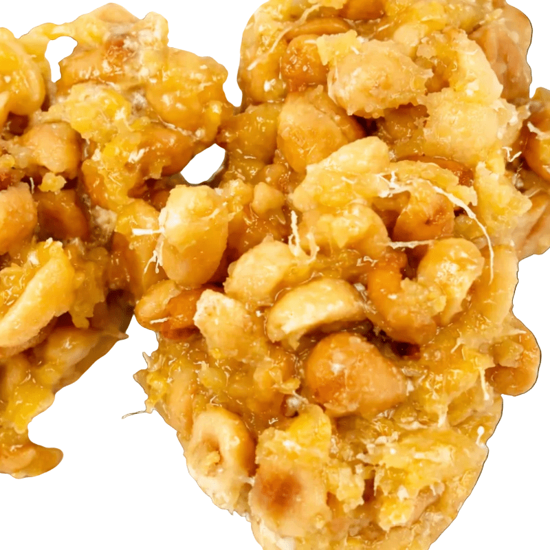 Close-up of Grenadian Groundnut Sugar cakes a white background